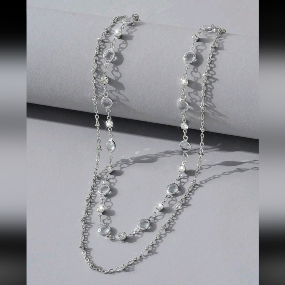 Elegant Silver Necklace with White Glass Accents